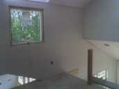 06_05_19_drywall loft looking west.jpg